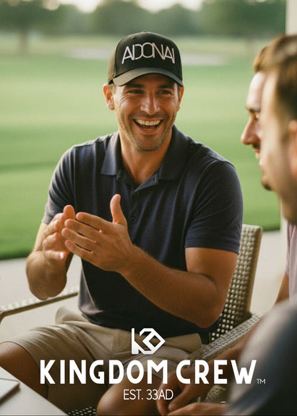Two men sitting outdoors with a golf course in the background, featuring the Kingdom Crew logo.