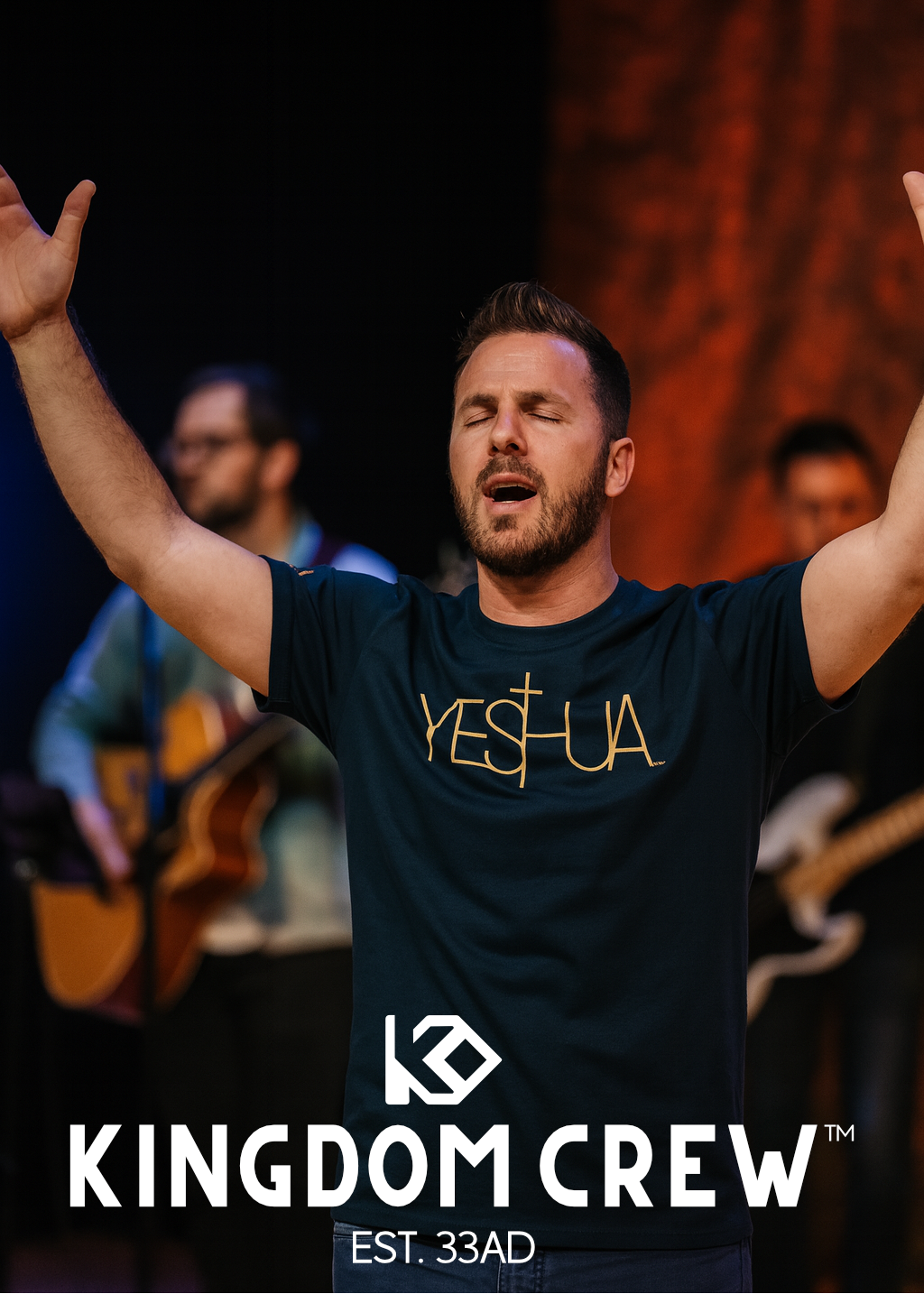 Man with arms raised wearing a 'YESHUA' shirt with Kingdom Crew branding.