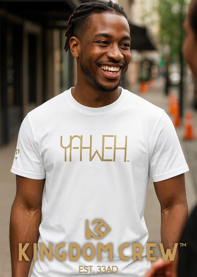 Man wearing a white t-shirt with 'Yahweh' and 'Kingdom Crew' text, standing outdoors.